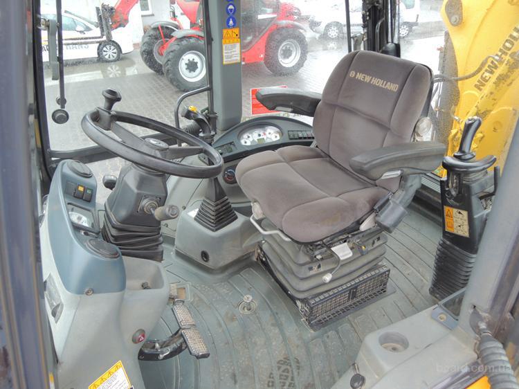 Экскаватор-погрузчик New Holland B100B