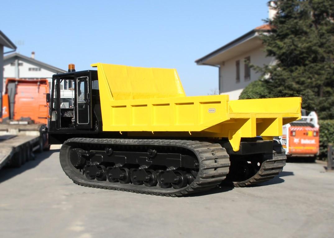 преимущества гусеничных самосвалов и их особенности