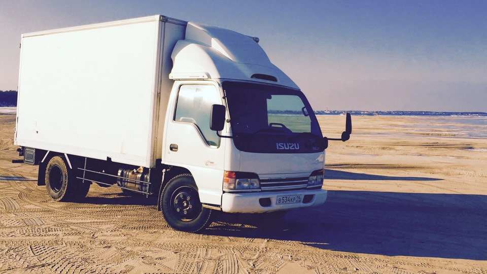 городские грузоперевозки грузовиком Isuzu Elf