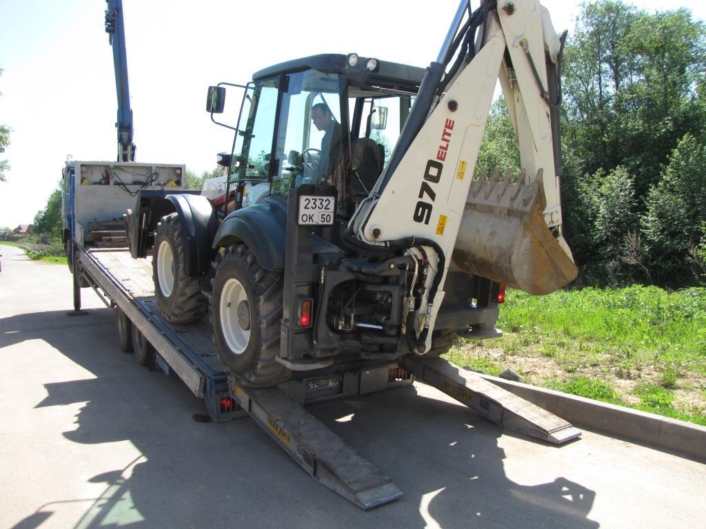 Бульдозер заезжает самоходом