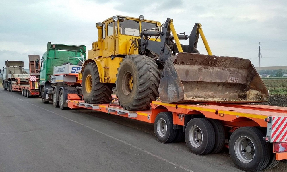 низкорамный трал для перевозки спецтехники 