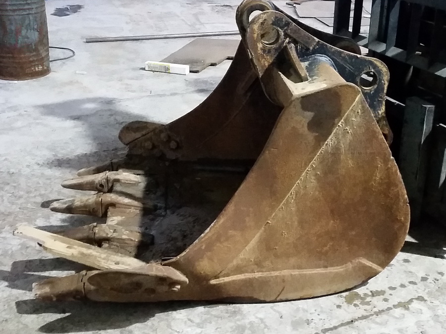 зуб ковша экскаватора